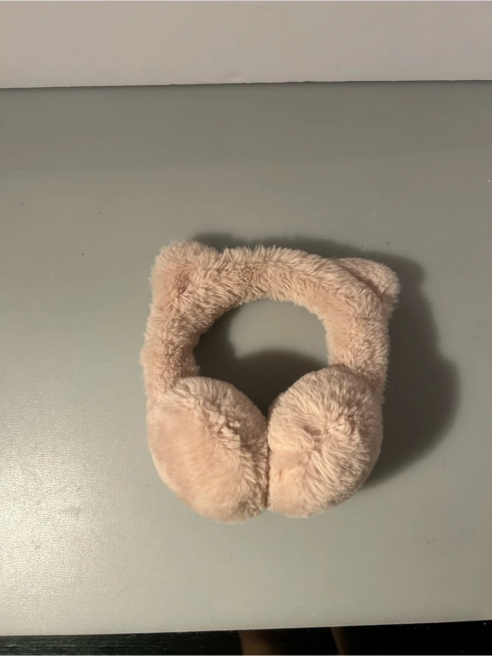 Kids pink fuzzy cat ear muffs